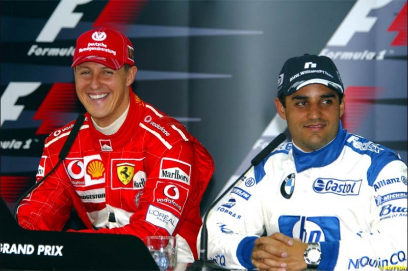 Michael Schumacher and Juan Pablo Montoya. Saturday qualifying for the Bahrain Grand Prix. Bahrain International Circuit, April 3rd 2004.