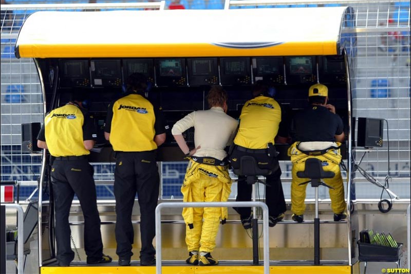 The Jordan pitwall. Saturday qualifying for the Bahrain Grand Prix. Bahrain International Circuit, April 3rd 2004.