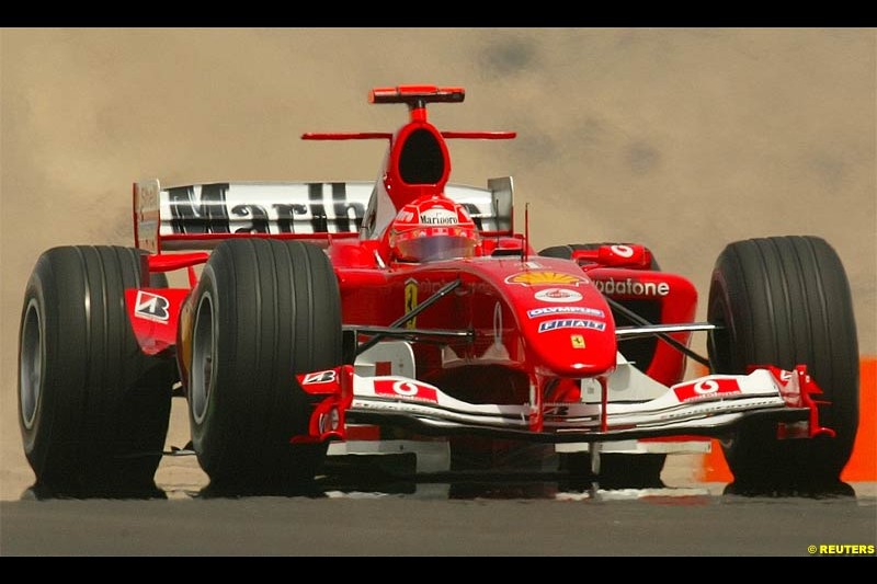 Michael Schumacher, Ferrari. Saturday qualifying for the Bahrain Grand Prix. Bahrain International Circuit, April 3rd 2004.