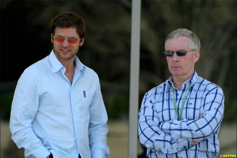 Steve and Dave Robertson, Kimi Raikkonen's managers. Saturday practice for the Bahrain Grand Prix. Bahrain International Circuit, April 3rd 2004.