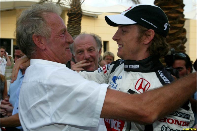 Jenson Button embraced by his father, John. The Bahrain Grand Prix. Bahrain International Circuit, April 4th 2004.