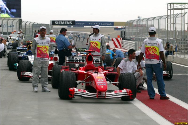 Parc Ferme inspections after the race. The Bahrain Grand Prix. Bahrain International Circuit, April 4th 2004.