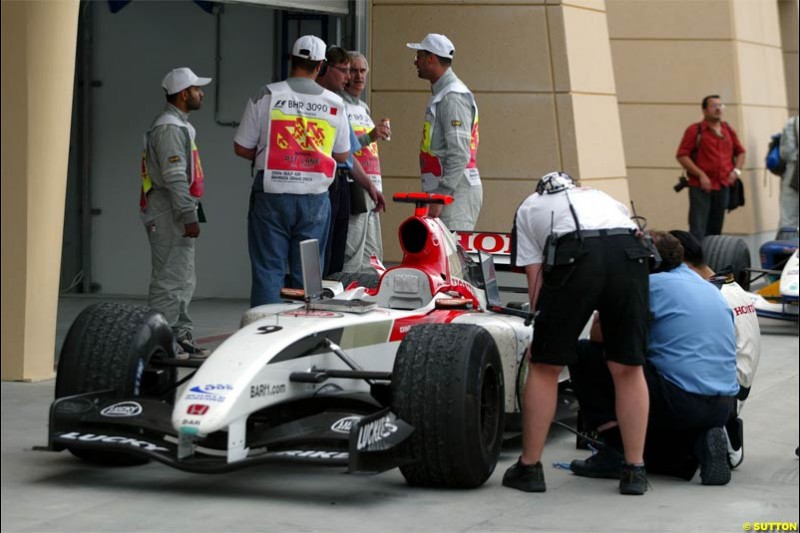 Jenson Button's car inspected at Parc Ferme. The Bahrain Grand Prix. Bahrain International Circuit, April 4th 2004.