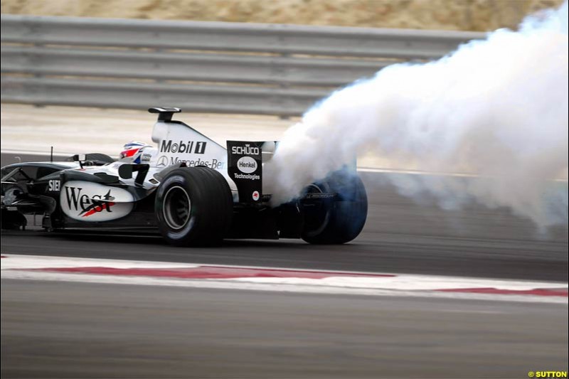 Kimi Raikkonen, McLaren, expires. The Bahrain Grand Prix. Bahrain International Circuit, April 4th 2004.