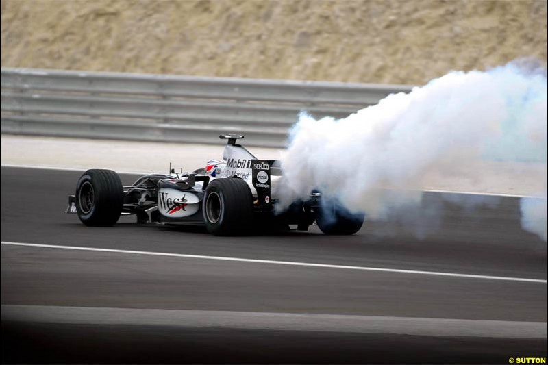 Kimi Raikkonen, McLaren, expires. The Bahrain Grand Prix. Bahrain International Circuit, April 4th 2004.