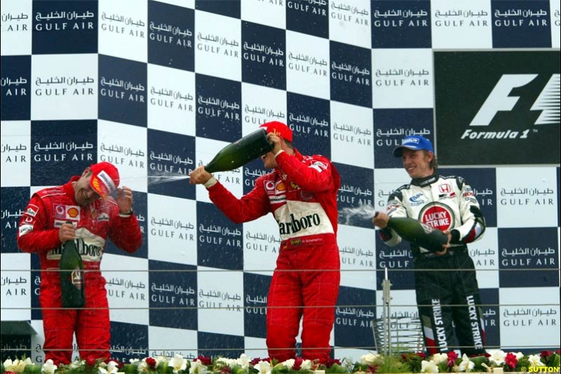 The Podium. 1st, Michael Schumacher, Ferrari; 2nd, Rubens Barrichello, Ferrari; 3rd, Jenson Button, BAR. The Bahrain Grand Prix. Bahrain International Circuit, April 4th 2004.