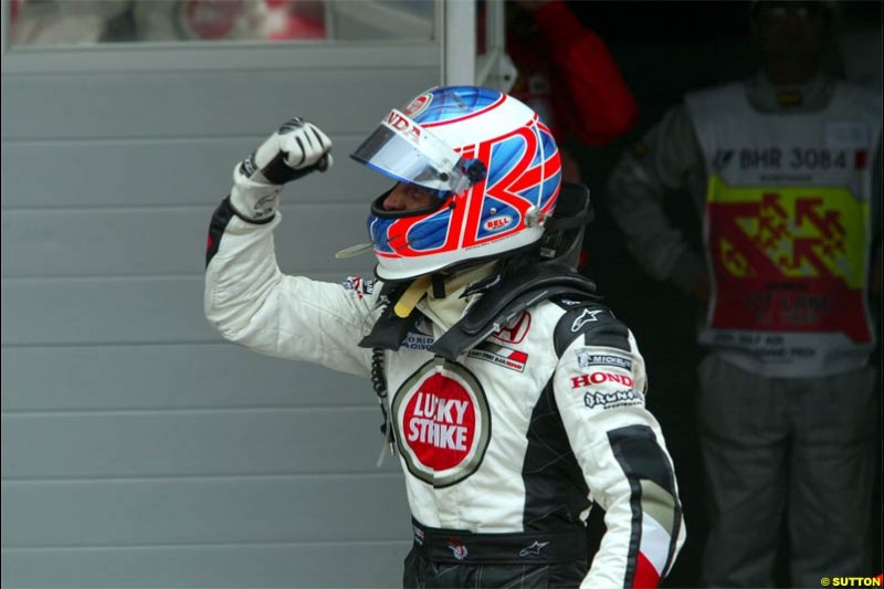 Jenson Button, BAR, celebrates third place. The Bahrain Grand Prix. Bahrain International Circuit, April 4th 2004.
