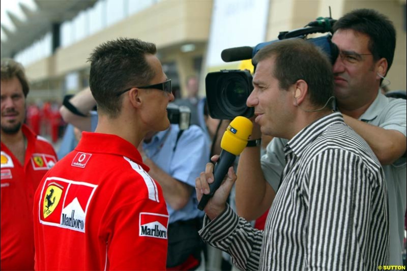 Michael Schumacher, Ferrari, is interviewed. The Bahrain Grand Prix. Bahrain International Circuit, April 4th 2004.