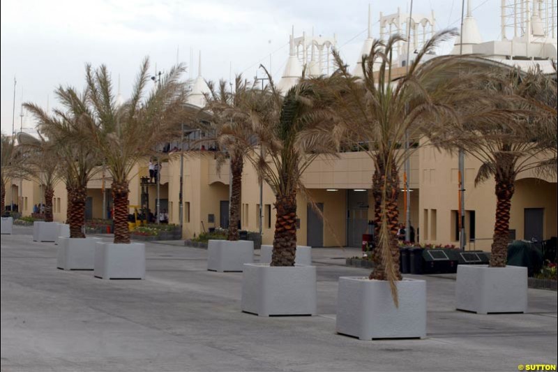 An wet, windy, and empty paddock on race morning. Race Day for the Bahrain Grand Prix. Bahrain International Circuit, April 4th 2004.