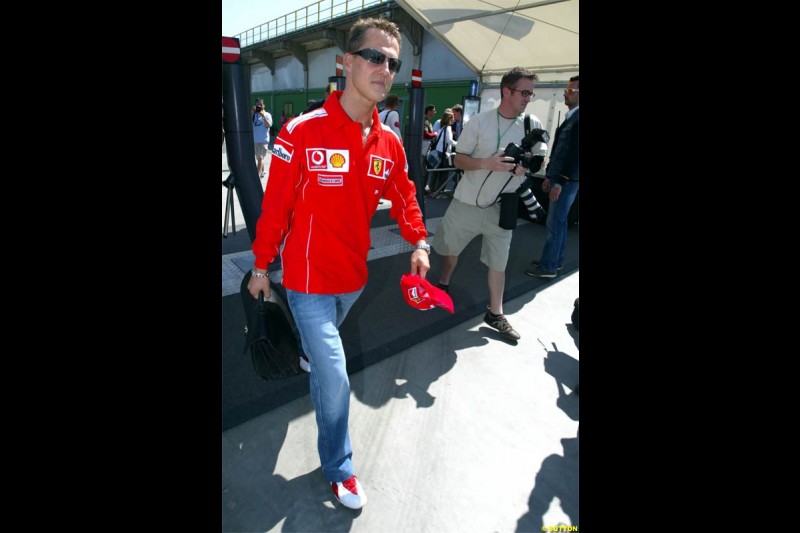 Michael Schumacher, Ferrari, arrives. San Marino Grand Prix preparations at the Imola circuit. April 22nd, 2004.