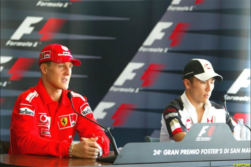 Michael Schumacher, Ferrari, together with Takuma Sato, BAR. San Marino Grand Prix preparations at the Imola circuit. April 22nd, 2004.