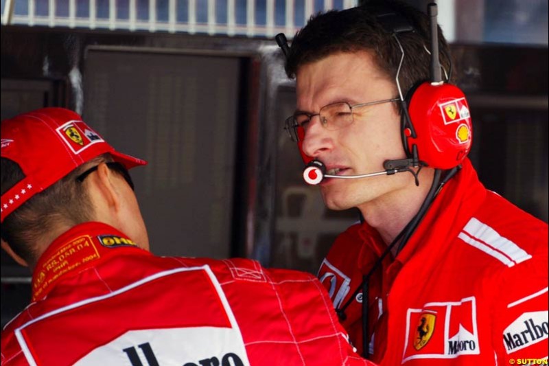 Michael Schumacher and Engineer Chris Dyer, Spanish GP, Friday May 7th, 2004.