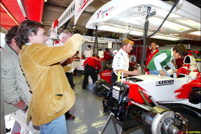 Toyota guest Carlos Sainz and his son tour the garage, Spanish GP, Saturday May 8th, 2004.