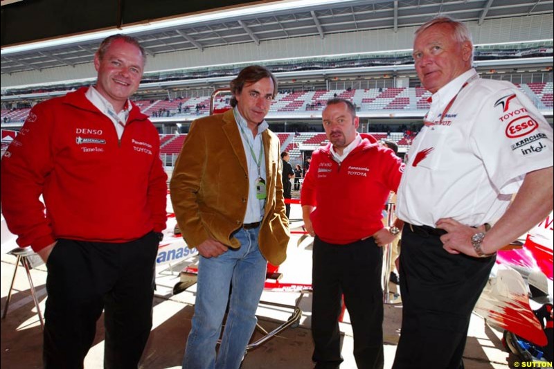 Carlos Sainz with Richard Cregan, Mike Gascoyne, and Ove Andersson; Toyota, Spanish GP, Saturday May 8th, 2004.