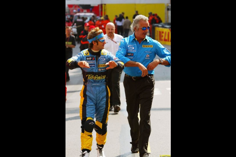 Jarno Trulli  and   Flavio Briatore,  Monaco GP, Thursday May 20th, 2004.