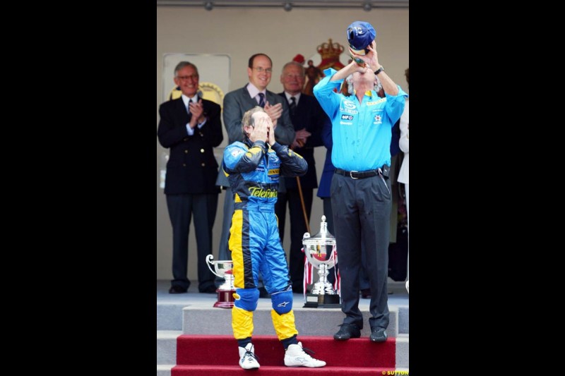 Jarno Trulli and Flavio Briatore, Monaco GP, Sunday May 23rd, 2004.