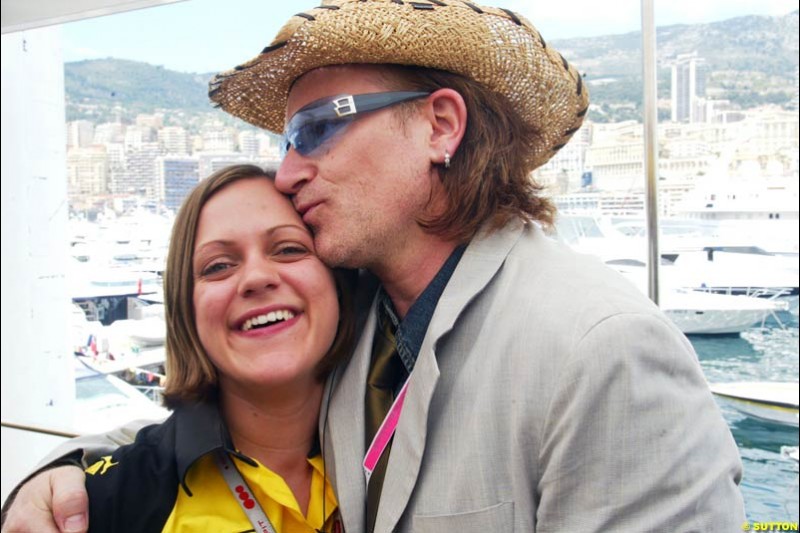 Jordan Press Officer Helen Temple with Bono, Monaco GP, Sunday May 23rd, 2004.