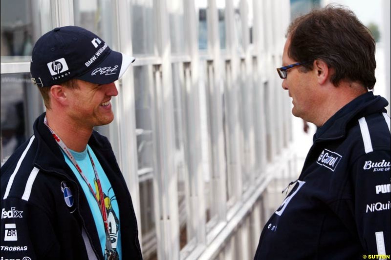 Ralf Schumacher and Frank Dernie, European GP, Thursday May 27th, 2004.
