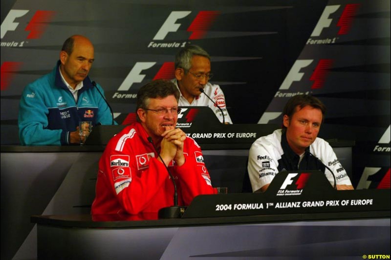 Peter Sauber, Tsutomu Tomita, Ross Brawn, and Sam Michael; European GP, Friday May 28th, 2004.
