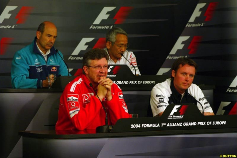 Peter Sauber, Tsutomu Tomita, Ross Brawn, and Sam Michael;  European GP, Friday May 28th, 2004.