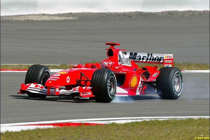  Michael Schumacher (GER) Ferrari F2004 locks up under braking. Formula One World Championship, Rd 7, European Grand Prix, Nurburgring, Germany, Practice, 28 May 2004. 