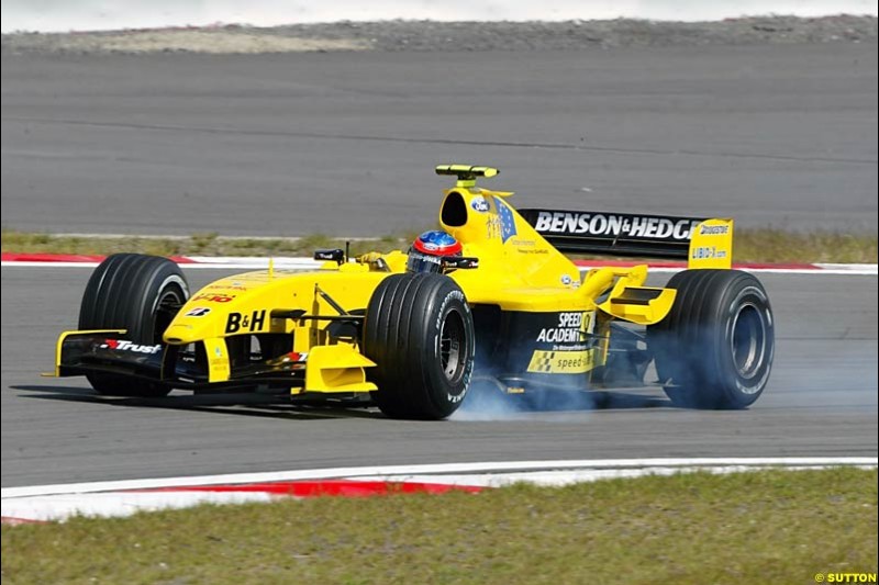 Timo Glock (GER) Jordan Test Driver locks up under braking. Formula One World Championship, Rd 7, European Grand Prix, Nurburgring, Germany, Practice, 28 May 2004.