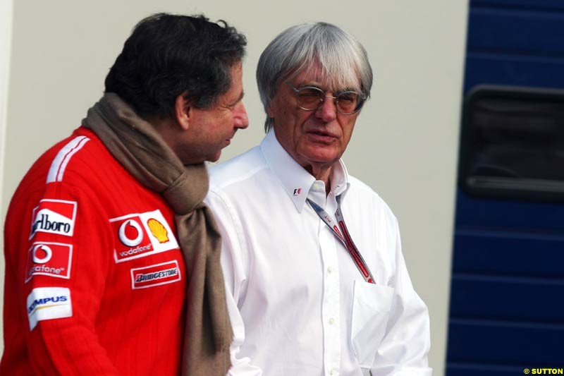 Jean Todt  and   Bernie Ecclestone,  European GP, Saturday May 29th, 2004.