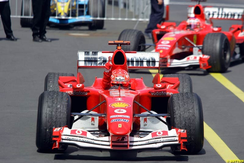 Michael Schumacher and Rubens Barrichello, Ferrari, European GP, Sunday May 30th, 2004.