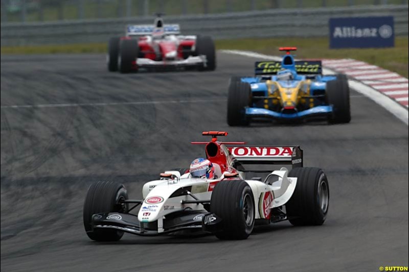 Jenson Button, BAR-Honda; Jarno Trulli, Renault; Olivier Panis, Toyota; European GP, Sunday May 30th, 2004.
