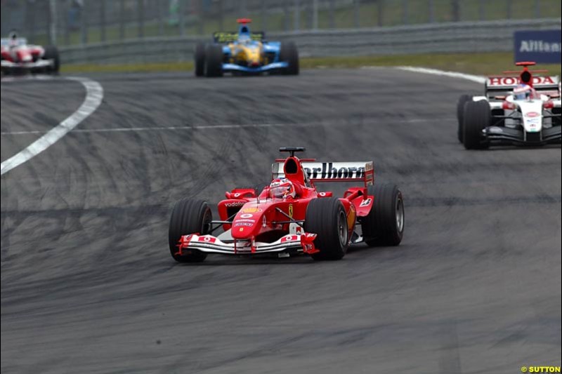 Rubens Barrichello, Ferrari; Jenson Button, BAR-Honda; Fernando Alonso, Renault; Olivier Panis, Toyota;  European GP, Sunday May 30th, 2004.