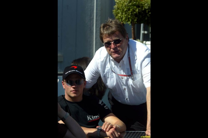 McLaren's Kimi Raikkonen with Mercedes motorsport director Norbert Haug. The Canadian Grand Prix, Montreal, Canada. Saturday, June 13th, 2004.