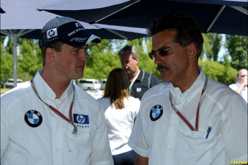 Ralf Schumacher, Williams, and BMW motorsport director Mario Theissen. The Canadian Grand Prix, Montreal, Canada. Saturday, June 13th, 2004.