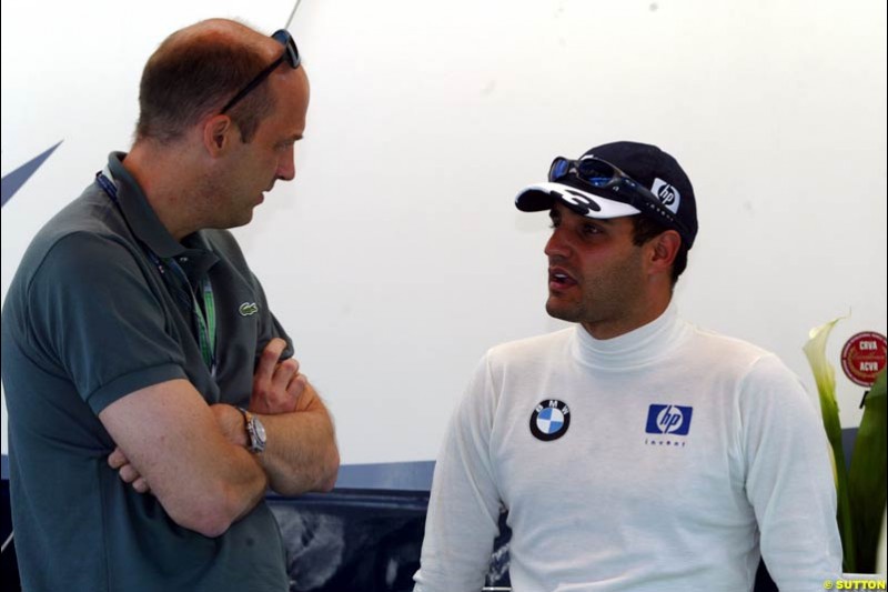 Former ER star Anthony Edwards chats with Williams driver Juan Pablo Montoya. The Canadian Grand Prix, Montreal, Canada. Saturday, June 13th, 2004.