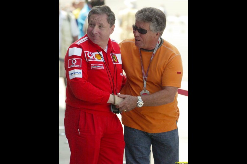 Jean Todt  and   Mario Andretti,  United States GP, Friday June 18th, 2004.