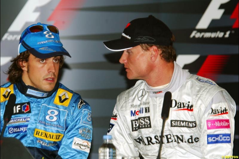 Fernando Alonso and David Coulthard at the FIA press conference. Saturday practice and qualifying for the French Grand Prix. Magny Cours, France. July 3rd 2004.