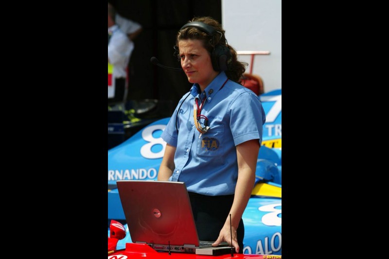 FIA scrutineer Christiana Pace. Saturday practice and qualifying for the French Grand Prix. Magny Cours, France. July 3rd 2004.