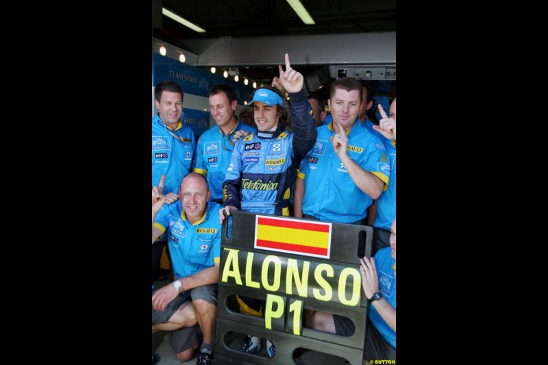 Fernando Alonso celebrates his first pole position of the season. Saturday practice and qualifying for the French Grand Prix. Magny Cours, France. July 3rd 2004.