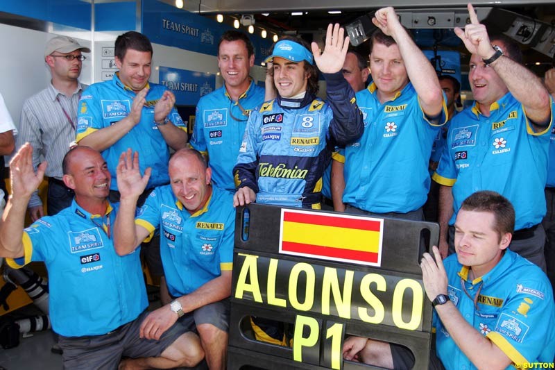 Fernando Alonso celebrates his first pole position of the season. Saturday practice and qualifying for the French Grand Prix. Magny Cours, France. July 3rd 2004.