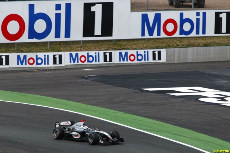 Saturday practice and qualifying for the French Grand Prix. Magny Cours, France. July 3rd 2004.