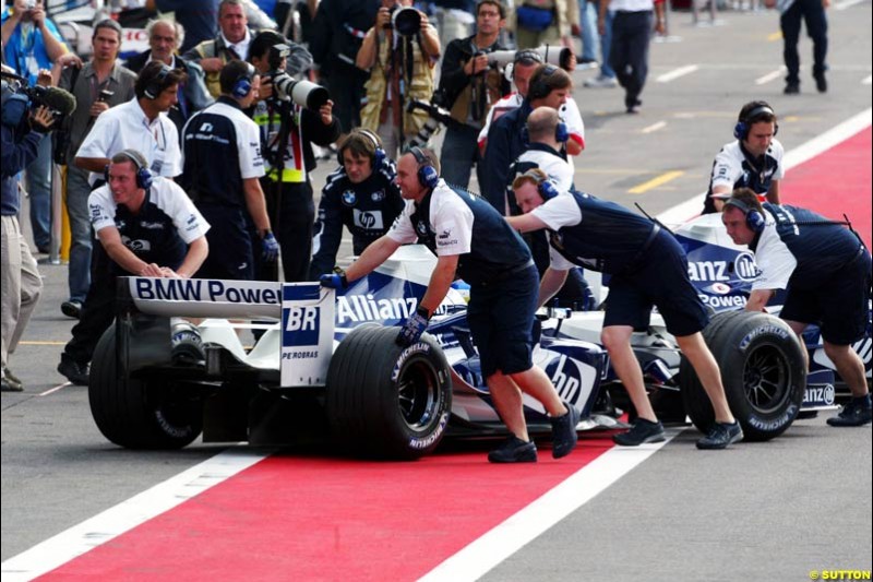 Saturday practice and qualifying for the French Grand Prix. Magny Cours, France. July 3rd 2004.