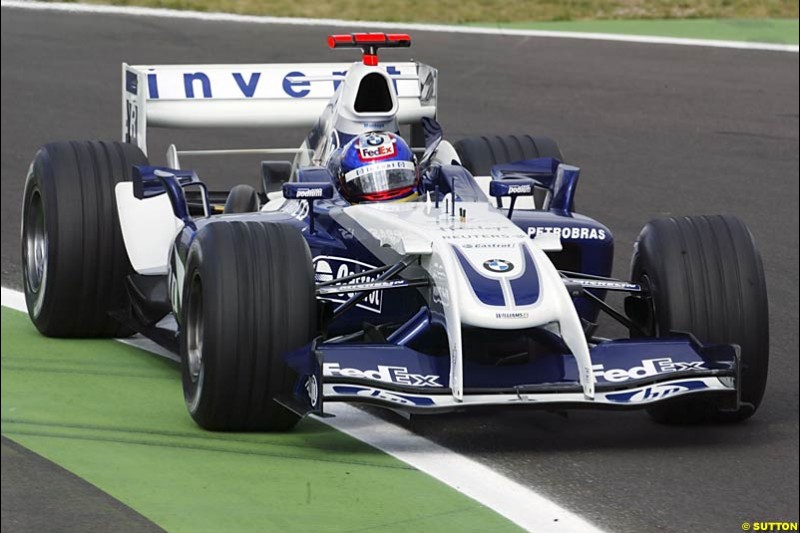 Saturday practice and qualifying for the French Grand Prix. Magny Cours, France. July 3rd 2004.
