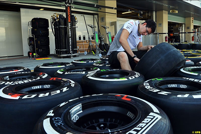 McLaren mechanic prepare Pirelli tyres in the pits, Formula One World Championship, Round 18, Abu Dhabi Grand Prix, Yas Marina Circuit, United Arab Emirates. Thursday 1 November 2012.