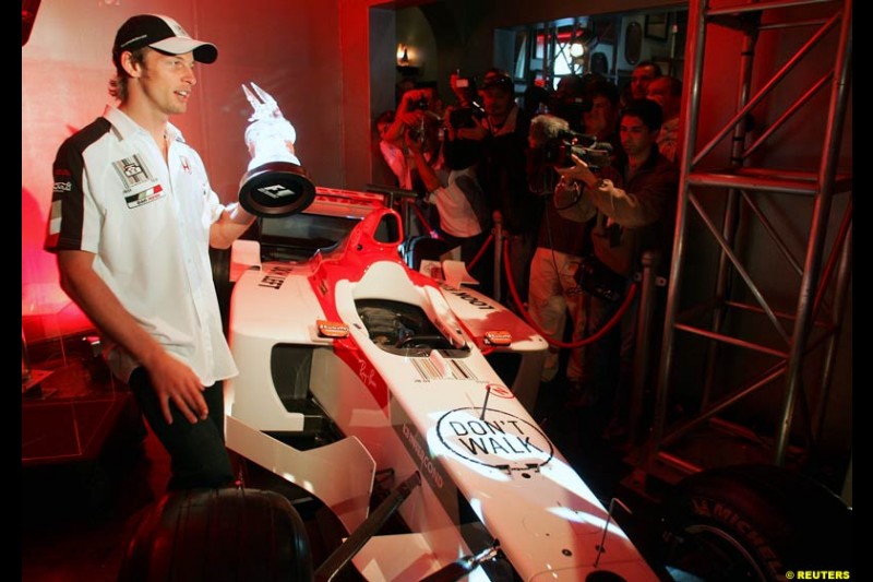 Jenson Button opens a photographic exhibit in Cape Town, South Africa. Tuesday, July 27th, 2004.