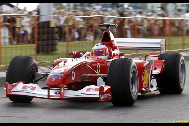 Rubens Barrichello, Ferrari, in a Ferrari car demonstration during the car show in Prague, July 21, 2004.  