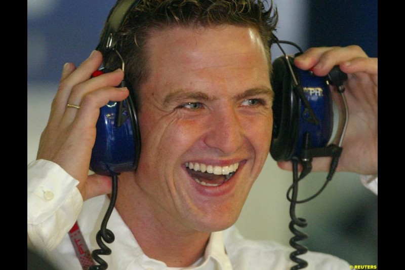 Ralf Schumacher visits the Williams pits during morning practice. German Grand Prix, Hockenheim, July 24th 2004.