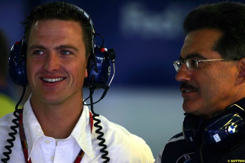 Ralf Schumacher with BMW Motorsport Director Mario Theissen, Morning practice for the German Grand Prix, Hockenheim, July 24th, 2004.