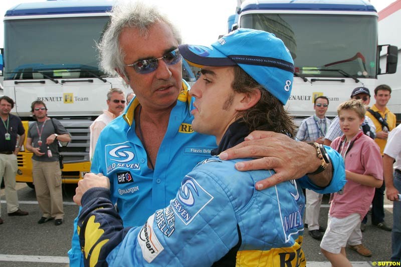 Flavio Briatore  and   Fernando Alonso; German GP, Sunday July 25th, 2004.