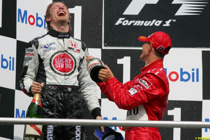 Jenson Button and Michael Schumacher; German GP, Sunday July 25th, 2004.
