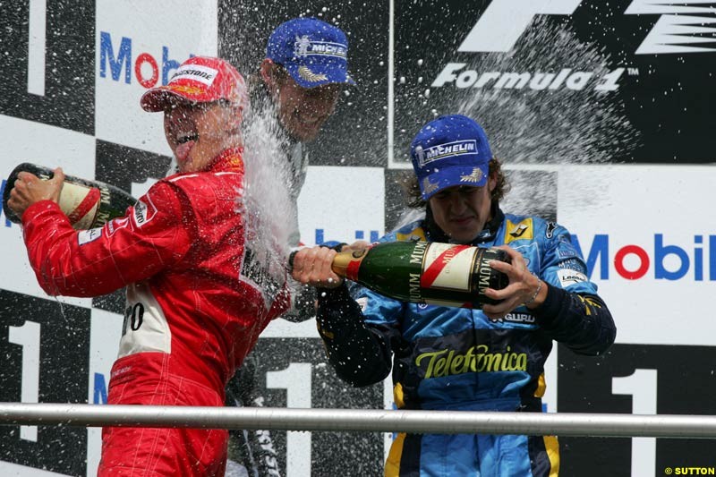 Michael Schumacher  and   Fernando Alonso; German GP, Sunday July 25th, 2004.