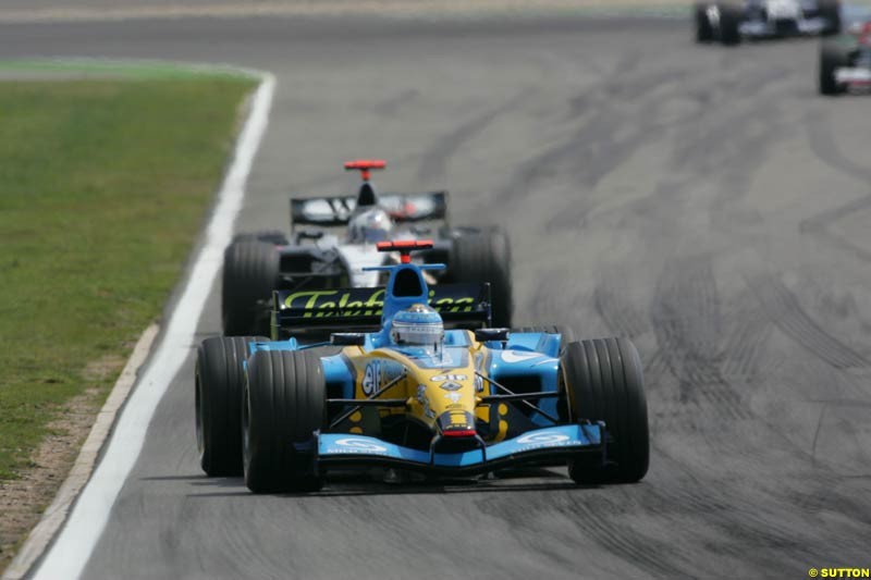 Jarno Trulli, Renault; David Coulthard, Mclaren-Mercedes, German GP, Sunday July 25th, 2004.